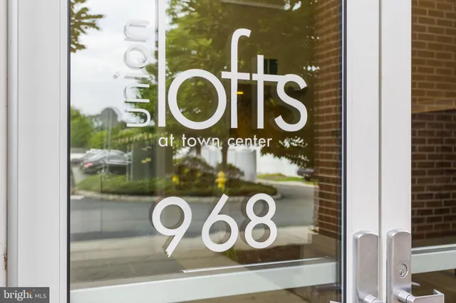 view of a door of a house with washer and dryer