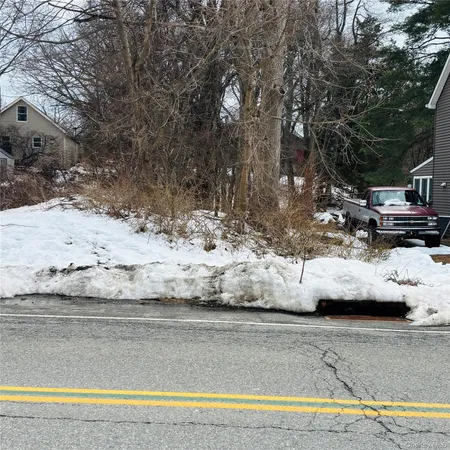 a view of a yard with a fountain
