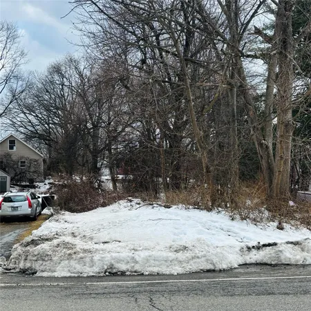 a view of road covered with snow