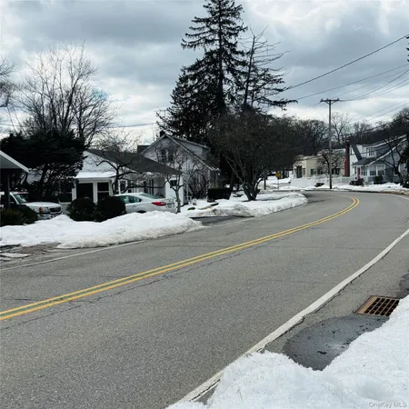 a view of street with houses