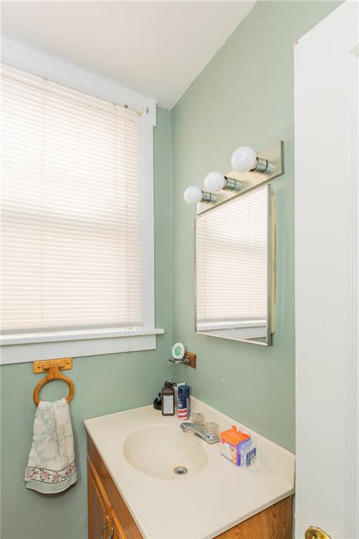 3 Alice Street McKees Rocks, PA 15136 - Photo 13 of 25 a bathroom with a sink and a mirror