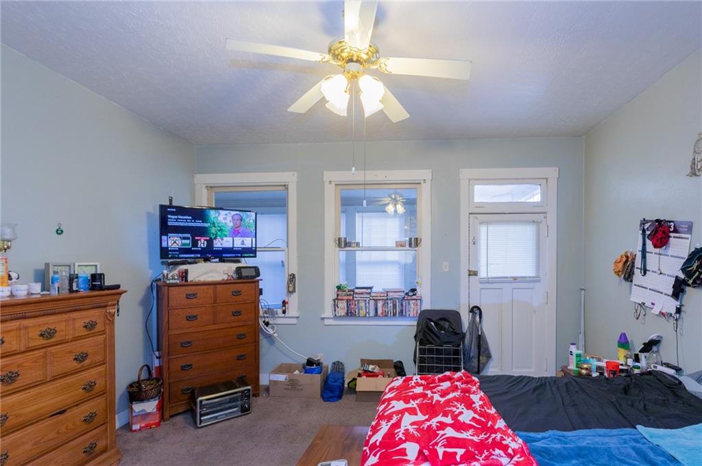 3 Alice Street McKees Rocks, PA 15136 - Photo 14 of 25 a bedroom with a bed and furniture