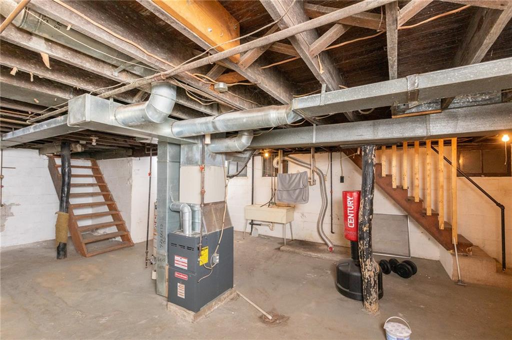 3 Alice Street McKees Rocks, PA 15136 - Photo 15 of 25 a view of an empty room with wooden floor