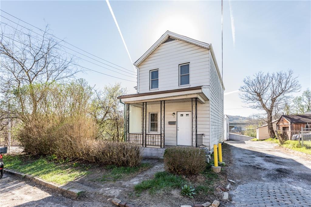 3 Alice Street McKees Rocks, PA 15136 - Photo 16 of 25 a view of a house with backyard and garden