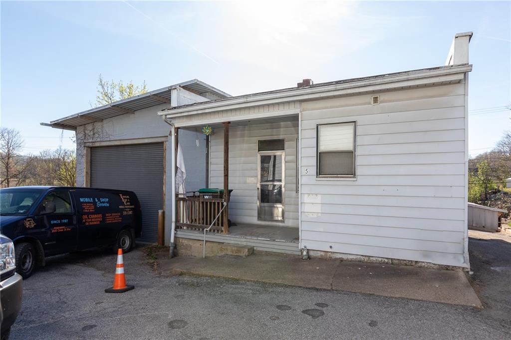 3 Alice Street McKees Rocks, PA 15136 - Photo 9 of 25 a car parked in front of a house