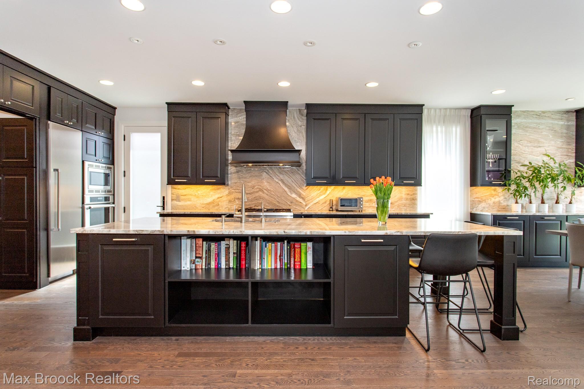 25925 York Road Royal Oak, MI 48067 - Photo 14 of 88 Kitchen featuring a large island, light stone countertops, dark wood-style floors, built in appliances, and recessed lighting