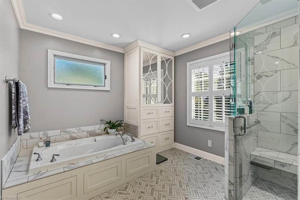 1106 Hammel Road Greensboro, NC 27408 - Photo 25 of 43 Primary bathroom, tub and shower