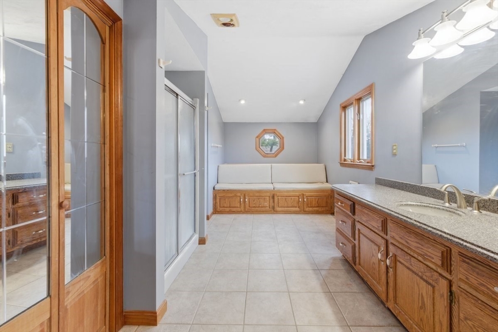 64 Village Street Millis, MA 02054 - Photo 24 of 41 a spacious bathroom with a sink and a mirror