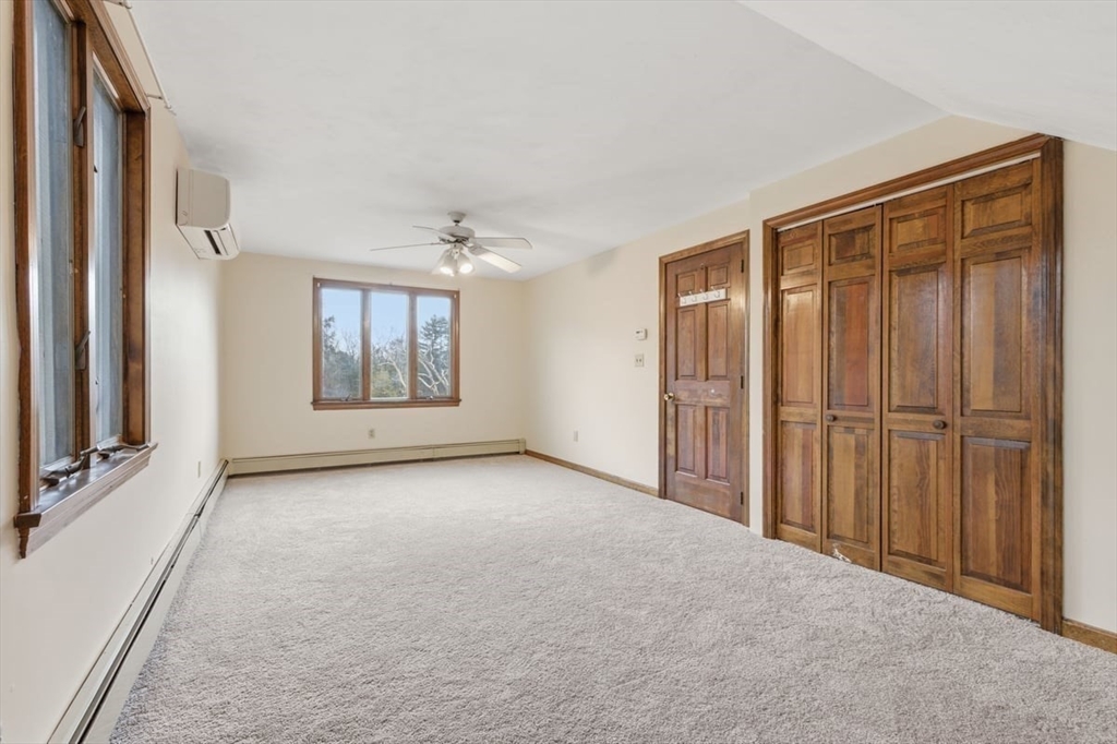 64 Village Street Millis, MA 02054 - Photo 25 of 41 an empty room with windows