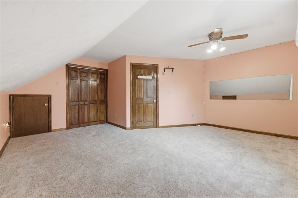 64 Village Street Millis, MA 02054 - Photo 27 of 41 a view of an empty room with a cabinet