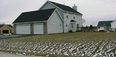 10596 Chicory Ridge Way Roscoe, IL 61073 - Photo 3 of 6 a view of a house with a backyard