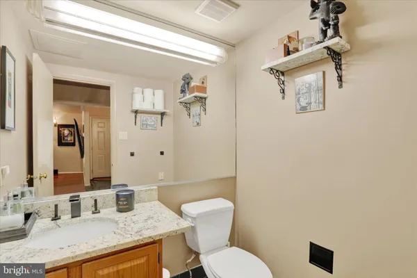 a kitchen with a sink stove and microwave