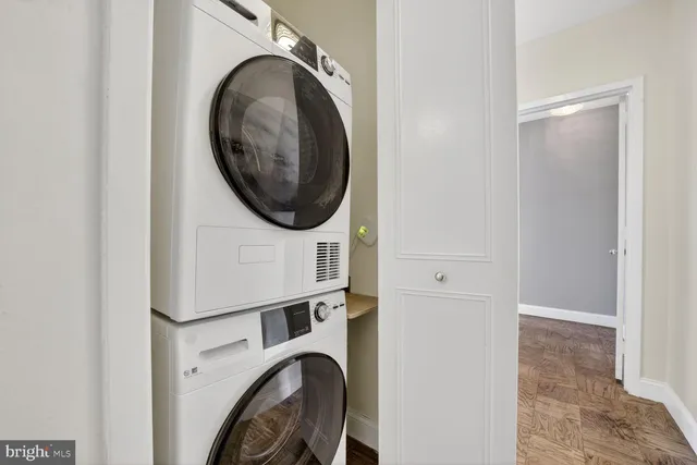 a view of storage and utility room with washer and dryer