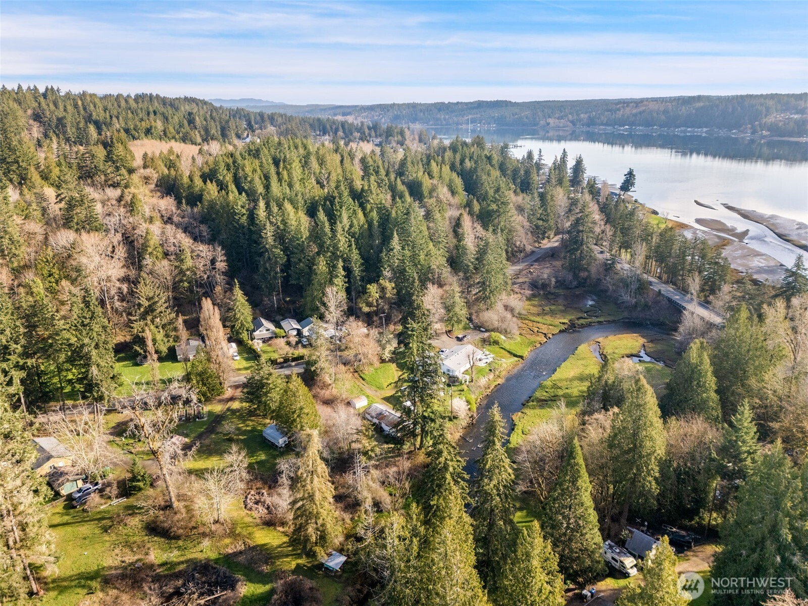 0 East Sherwood Creek Road Allyn, WA 98524 - Photo 18 of 20 a view of a lake and mountains in the background