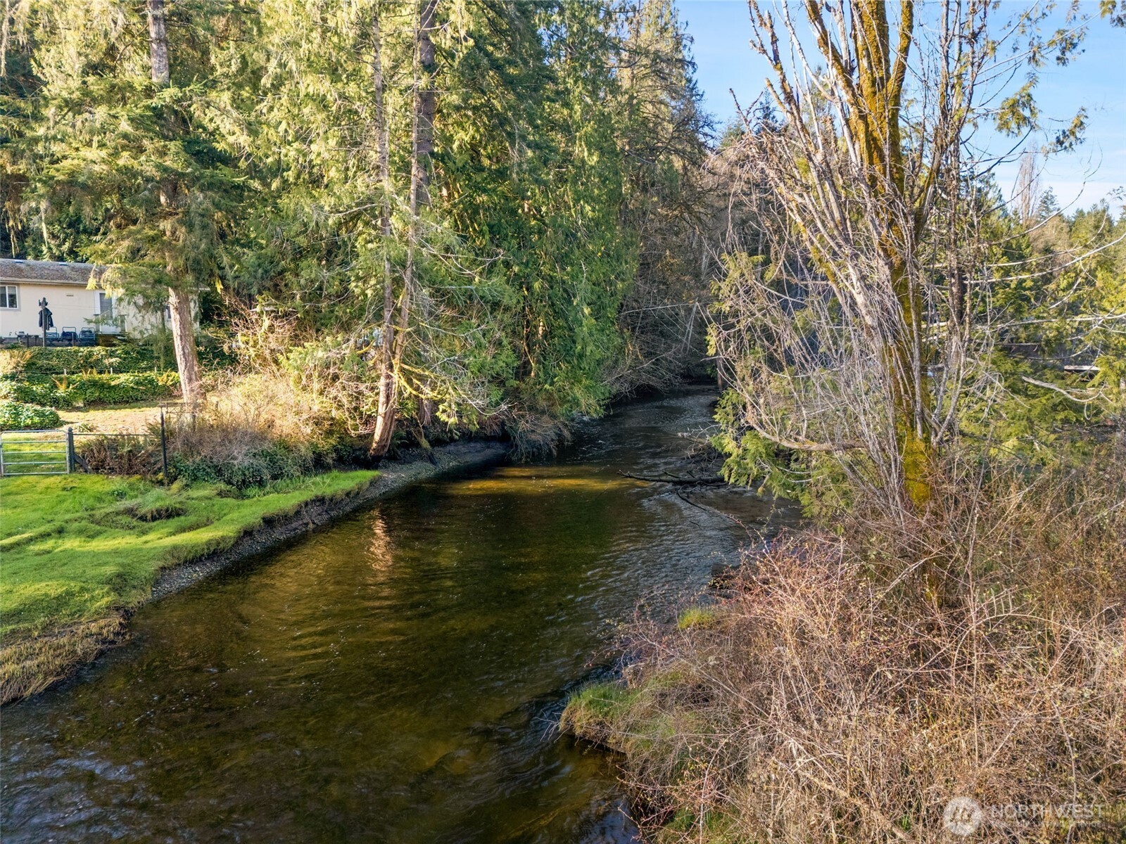 0 East Sherwood Creek Road Allyn, WA 98524 - Photo 3 of 20 a view of a water pond with green space