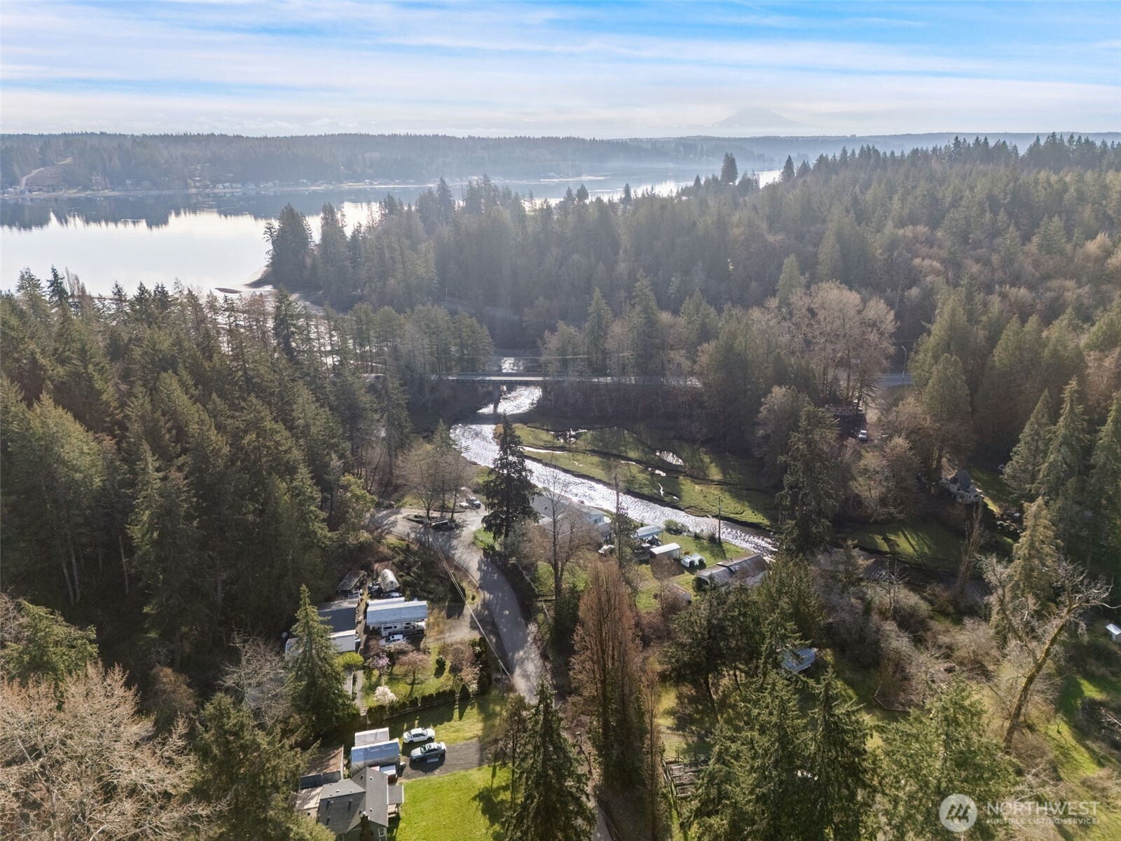 0 East Sherwood Creek Road Allyn, WA 98524 - Photo 10 of 20 a view of a city from a lake