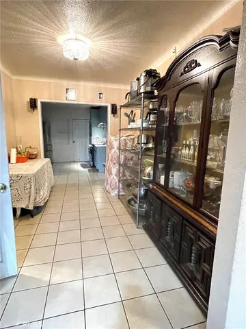 a view of a hallway with seating area