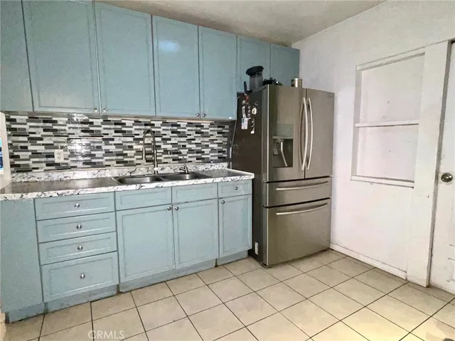 a kitchen with appliances and cabinets