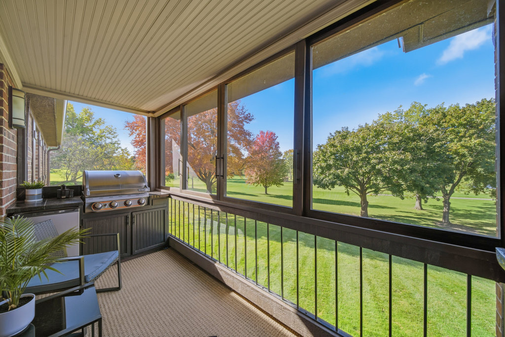 90 Golfview Lane, Unit D Frankfort, IL 60423 - Photo 22 of 27 a view of a city street from a balcony