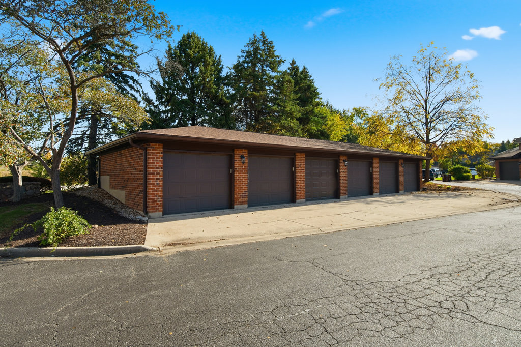 90 Golfview Lane, Unit D Frankfort, IL 60423 - Photo 6 of 27 a house with trees in front of it
