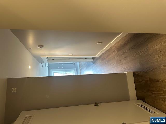 116 Washington Street, Unit 3D Newark, NJ 07102 - Photo 8 of 12 a view of a hallway with wooden floor