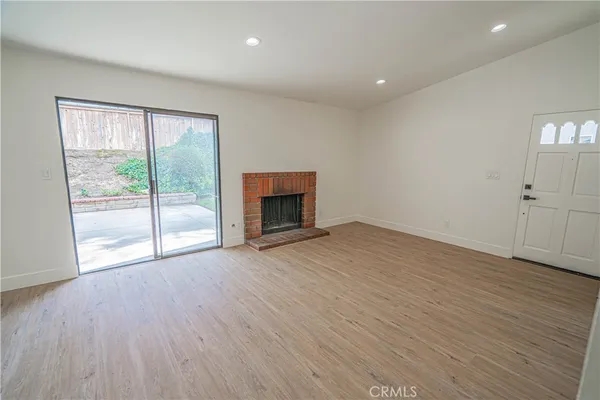 a view of kitchen with wooden floor