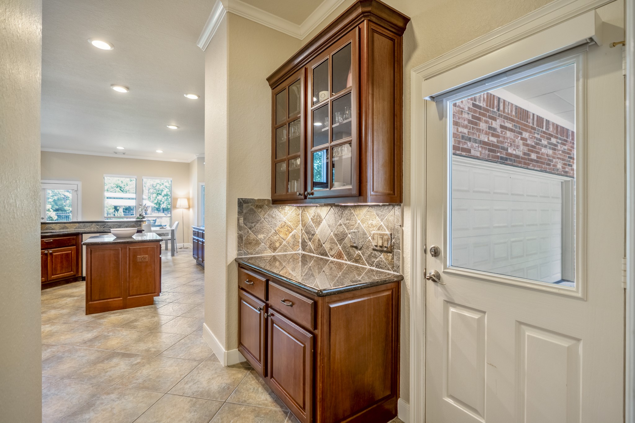67 North Pentenwell Circle Spring, TX 77382 - Photo 13 of 50 a view of a kitchen cabinets and a stove