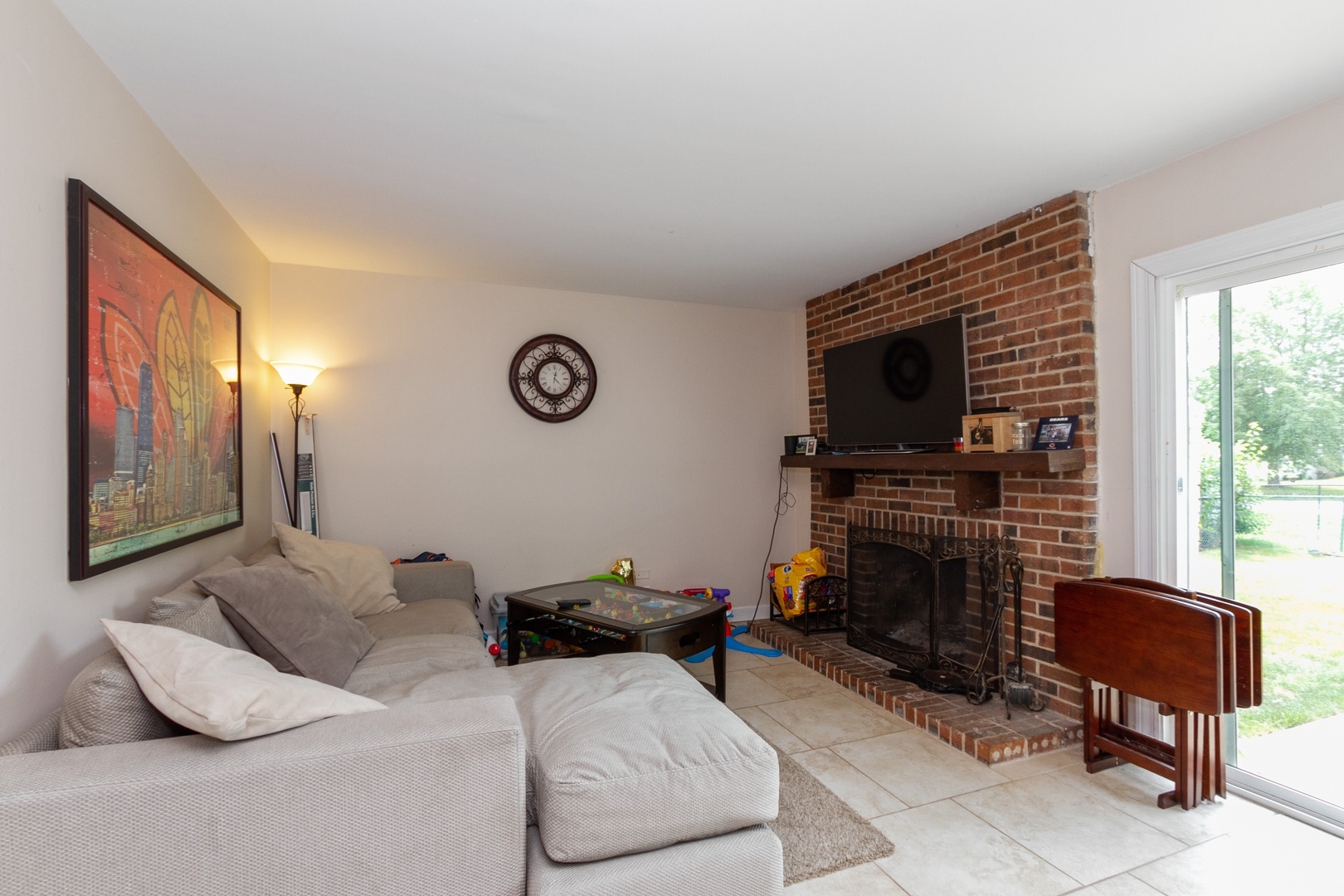 29 Pheasant Road Matteson, IL 60443 - Photo 4 of 10 a bedroom with furniture and a fireplace