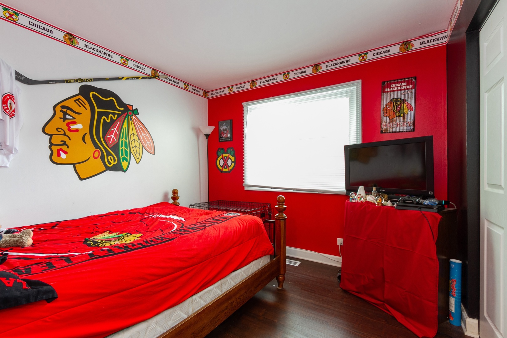29 Pheasant Road Matteson, IL 60443 - Photo 6 of 10 a bedroom with a bed and a flat screen tv