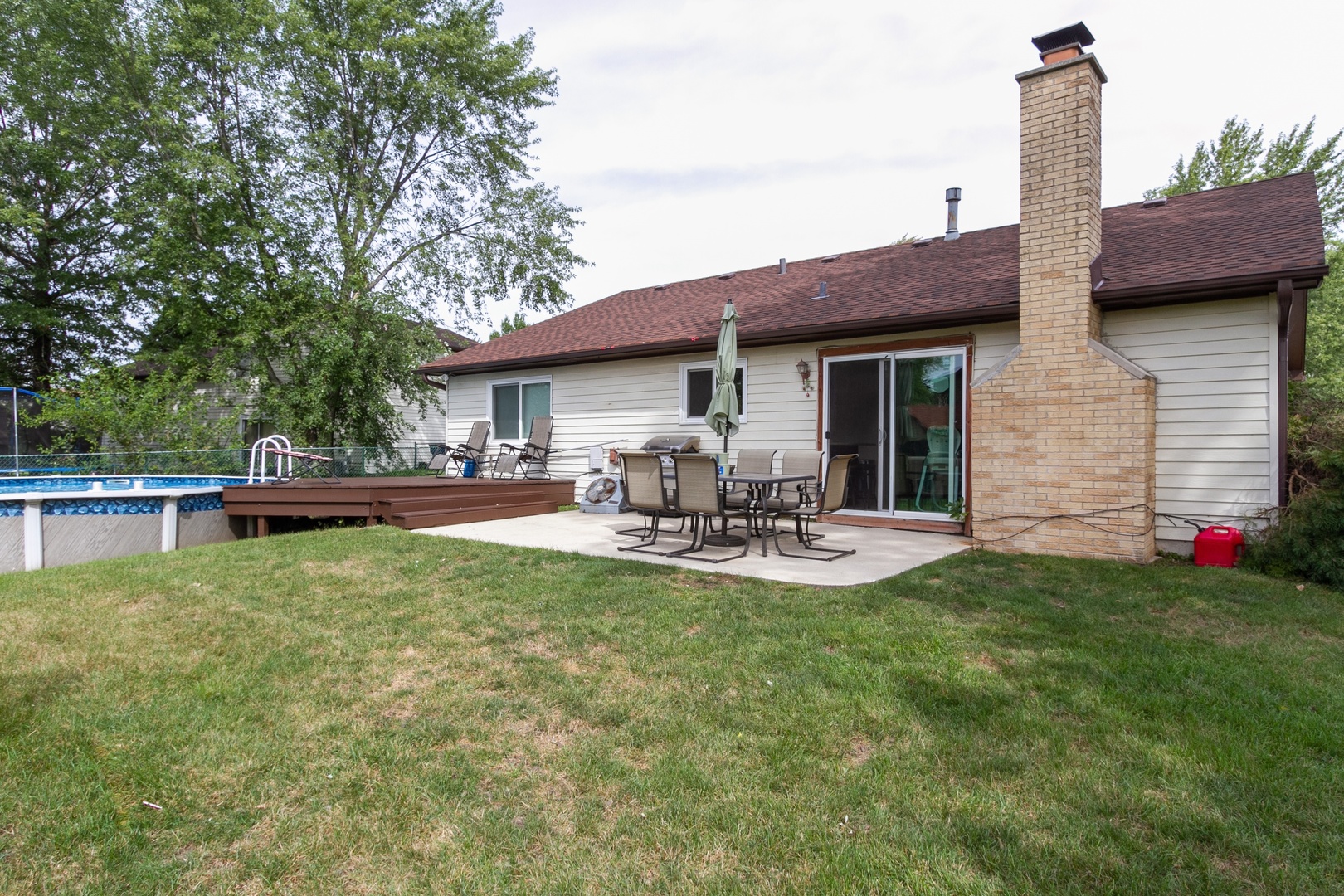 29 Pheasant Road Matteson, IL 60443 - Photo 10 of 10 a view of a house with patio and swimming pool