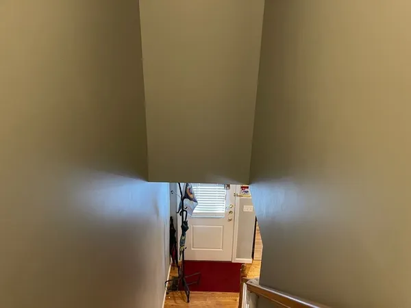 a bedroom with a bed and a closet