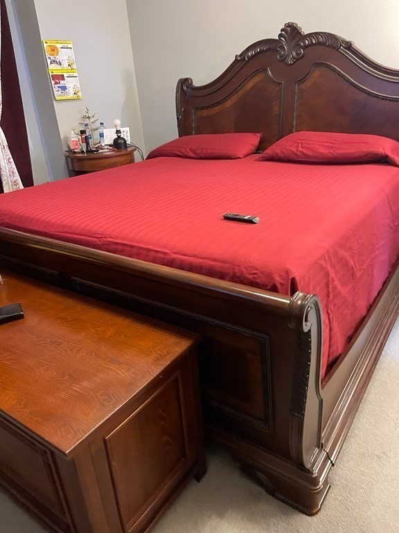 1289 Bay Street Springfield, MA 01109 - Photo 7 of 8 a bedroom with a bed and a closet