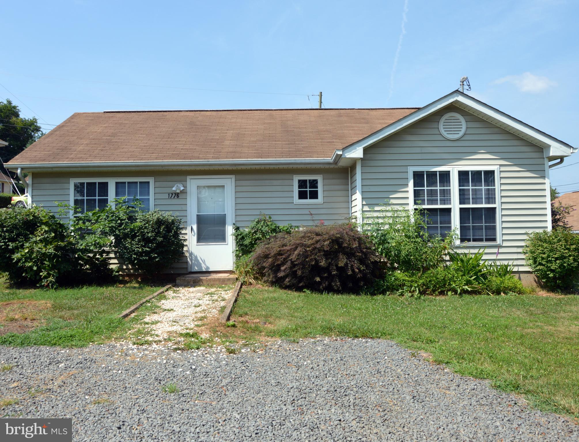 1776 Birch Drive Culpeper, VA 22701 - Photo 1 of 12 a view of a house with yard and plants