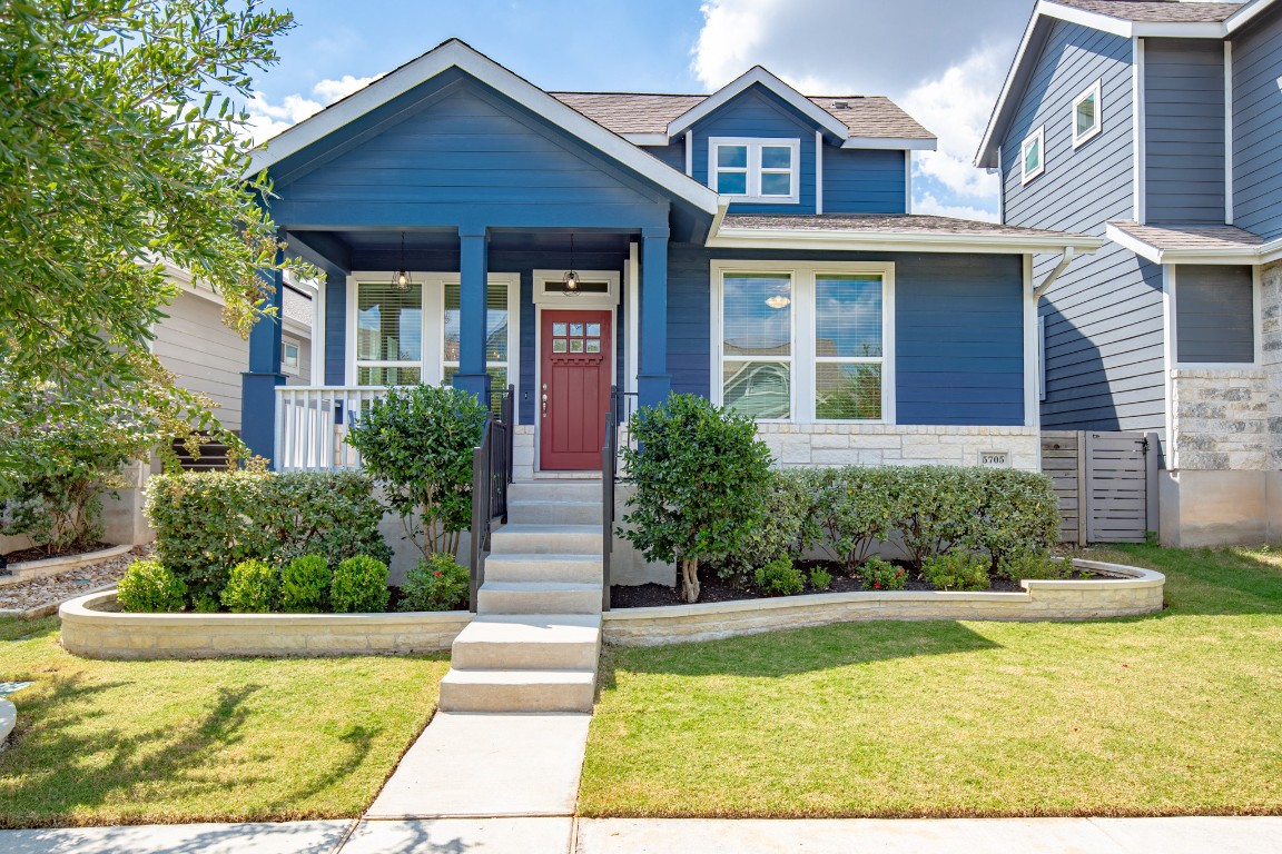 5705 Baythorne Drive Austin, TX 78747 - Photo 1 of 1 a front view of a house with a yard