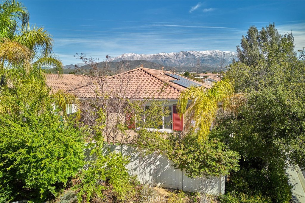 1143 Saguara Road Beaumont, CA 92223 - Photo 5 of 66 a view of a houses with a yard
