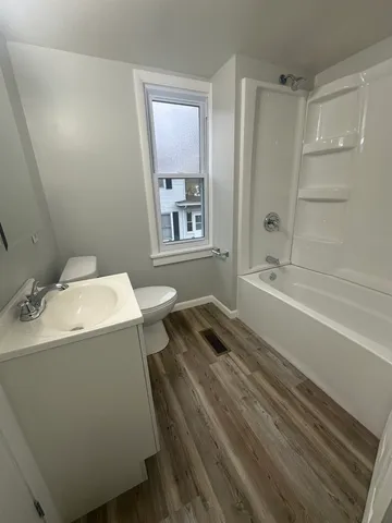 a bathroom with a sink and a bathtub