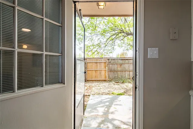 a view of a glass door with a window