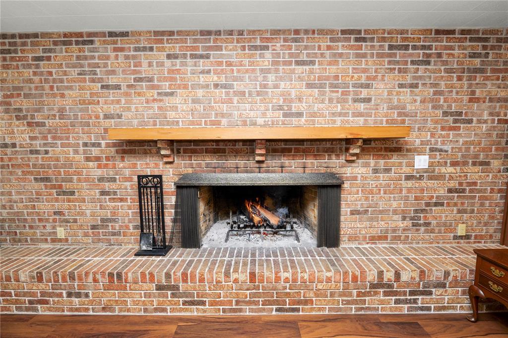 4615 Old Polk City Road Lakeland, FL 33809 - Photo 24 of 71 a view of a fireplace with a table