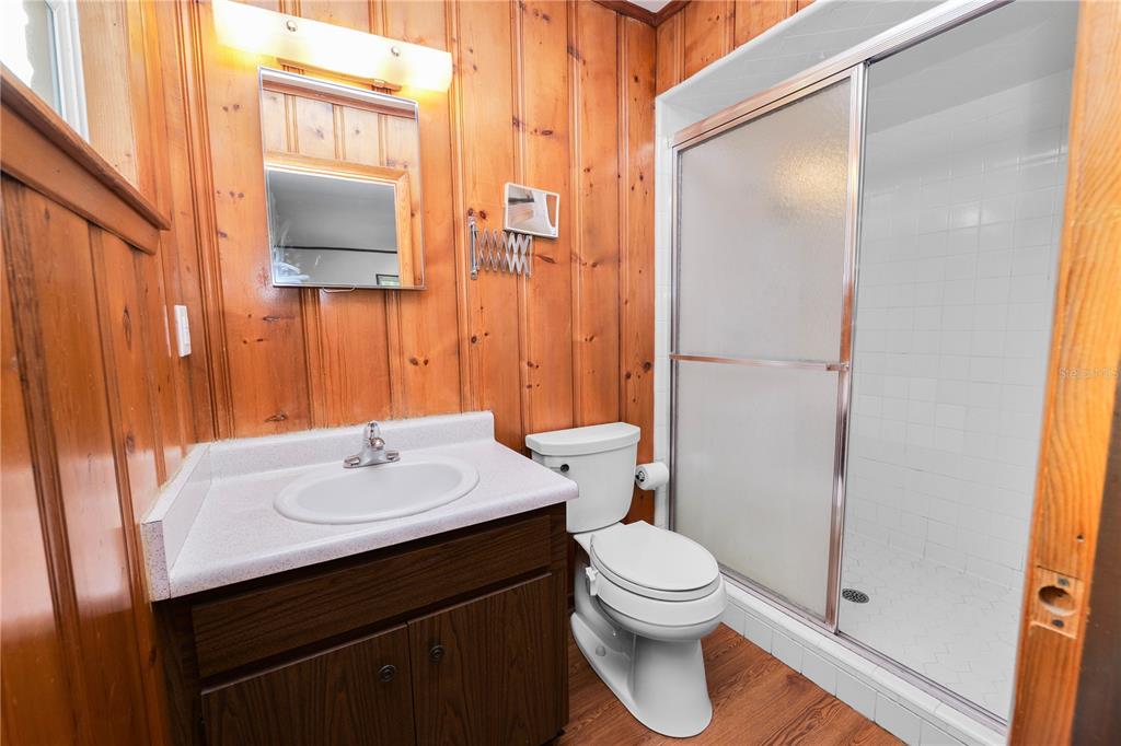 4615 Old Polk City Road Lakeland, FL 33809 - Photo 28 of 71 a bathroom with a sink toilet and shower