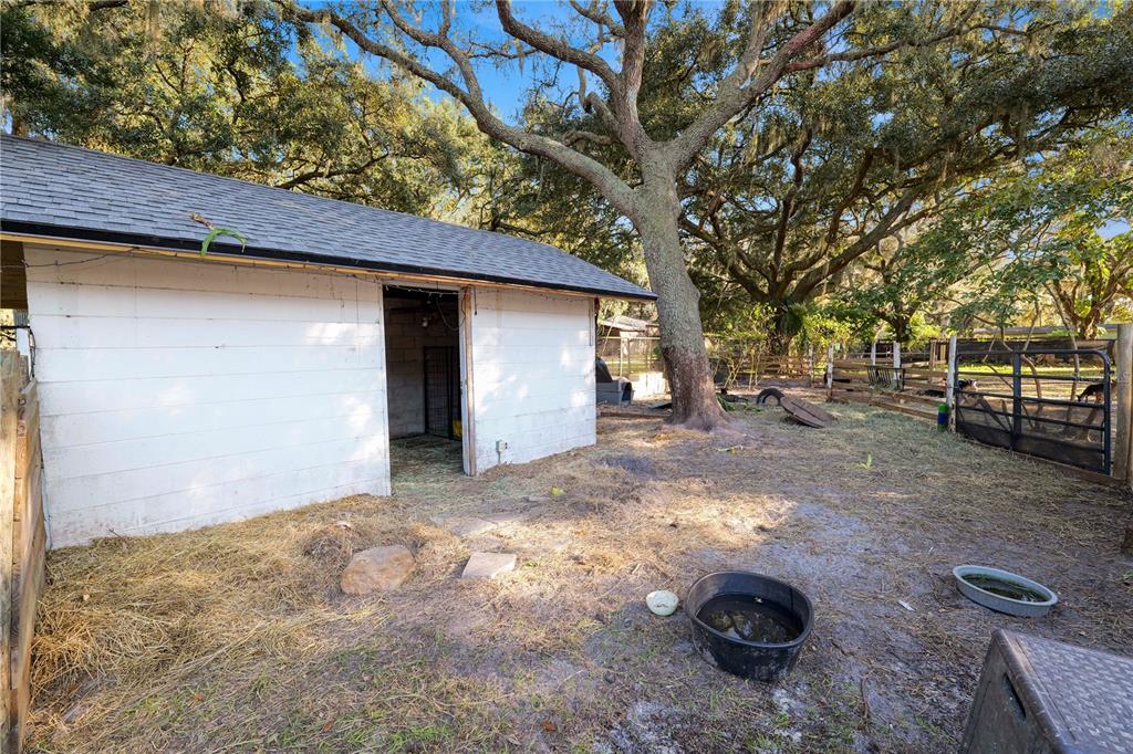 4615 Old Polk City Road Lakeland, FL 33809 - Photo 46 of 71 a view of a backyard with large trees