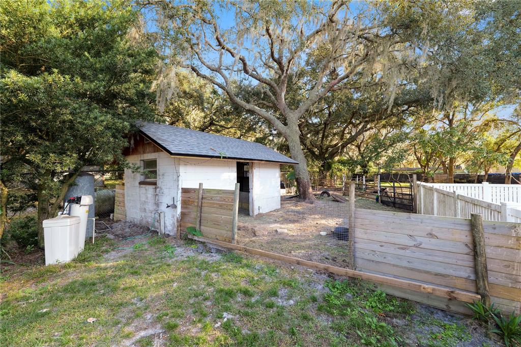 4615 Old Polk City Road Lakeland, FL 33809 - Photo 47 of 71 a view of a house with a yard