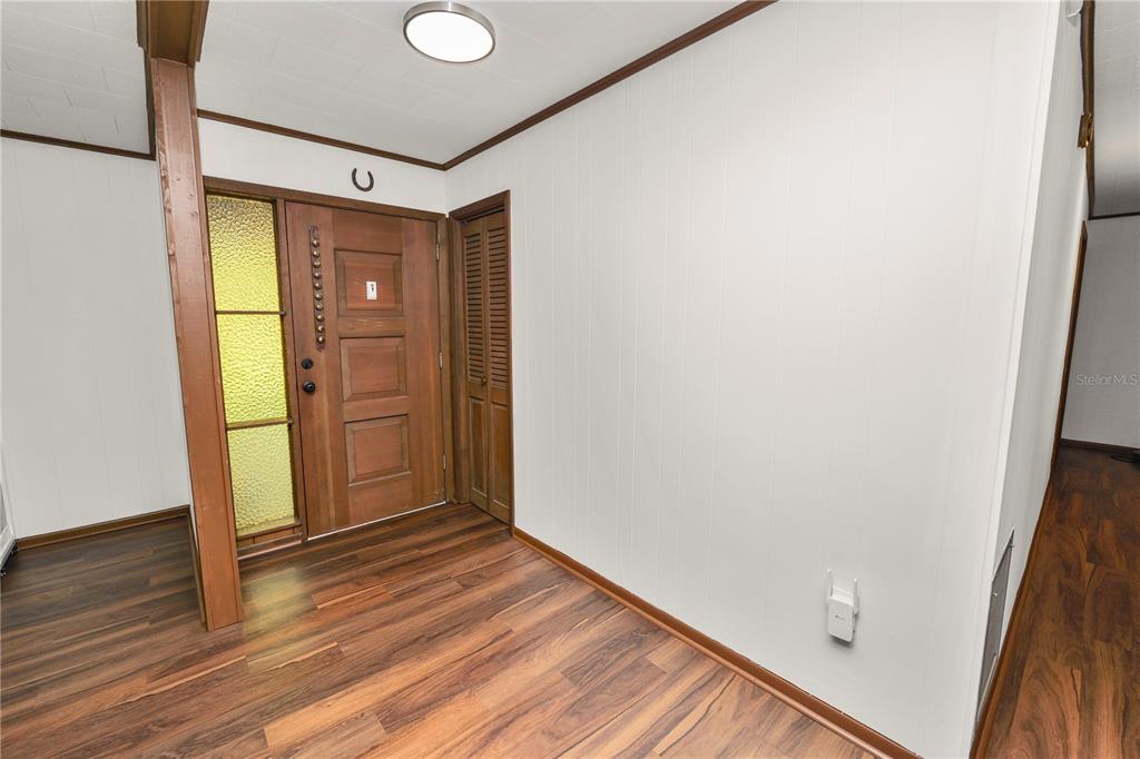 4615 Old Polk City Road Lakeland, FL 33809 - Photo 5 of 71 a view of hallway with wooden floor