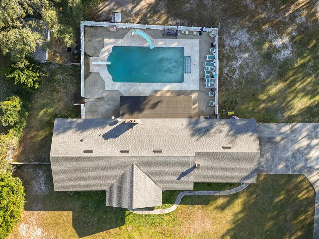 4615 Old Polk City Road Lakeland, FL 33809 - Photo 55 of 71 an aerial view of a house with a yard
