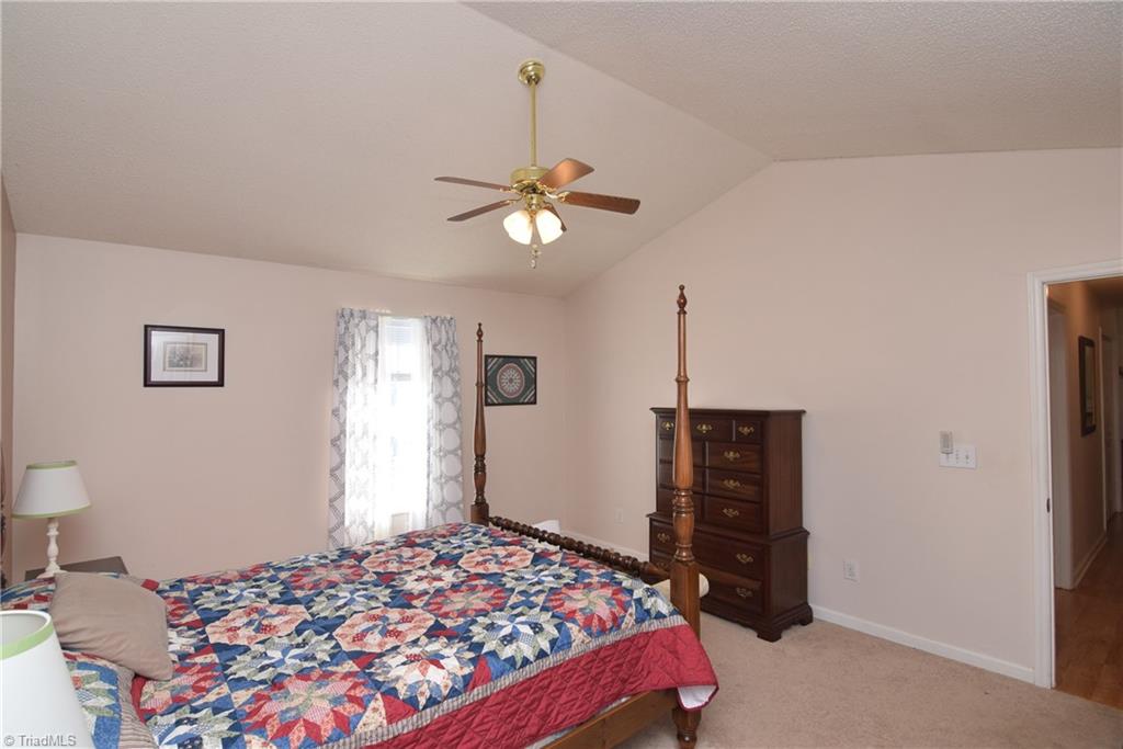 7207 Friendship Church Road Browns Summit, NC 27214 - Photo 16 of 49 Primary bedroom