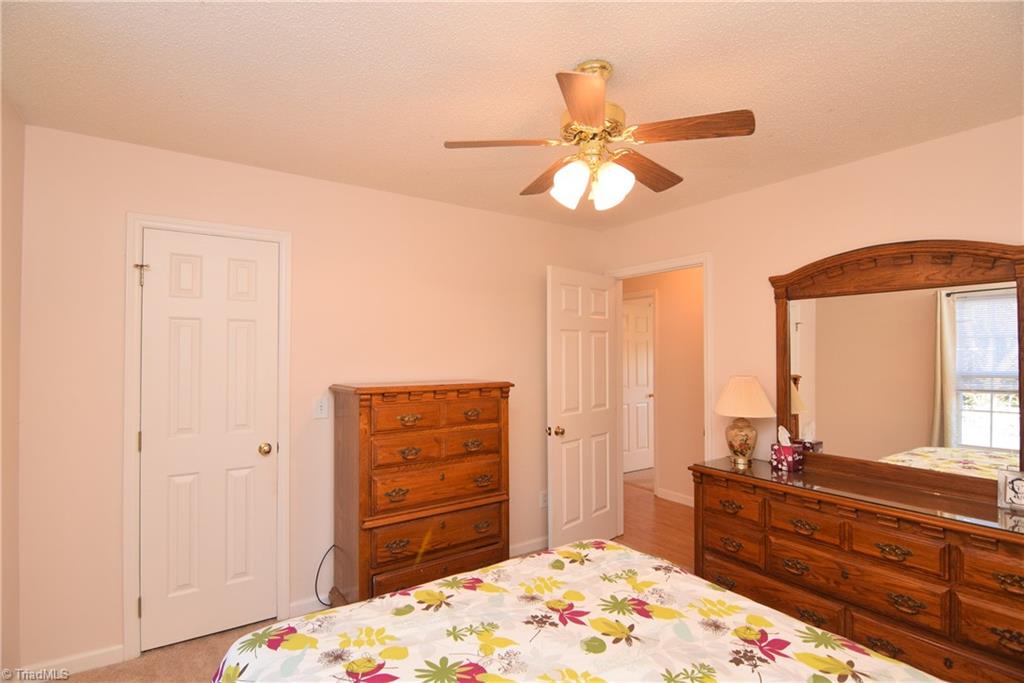 7207 Friendship Church Road Browns Summit, NC 27214 - Photo 22 of 49 Second bedroom has walk in closet