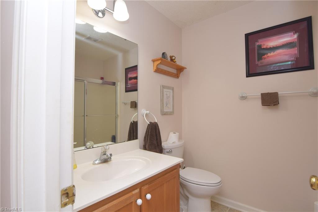 7207 Friendship Church Road Browns Summit, NC 27214 - Photo 23 of 49 Main level guest bathroom