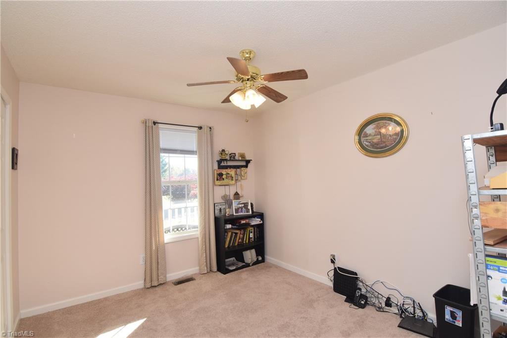7207 Friendship Church Road Browns Summit, NC 27214 - Photo 25 of 49 Third main level bedroom