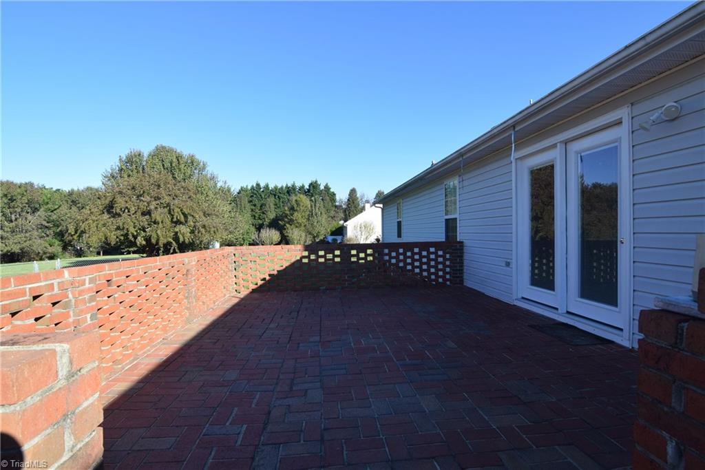 7207 Friendship Church Road Browns Summit, NC 27214 - Photo 28 of 49 Large brick patio