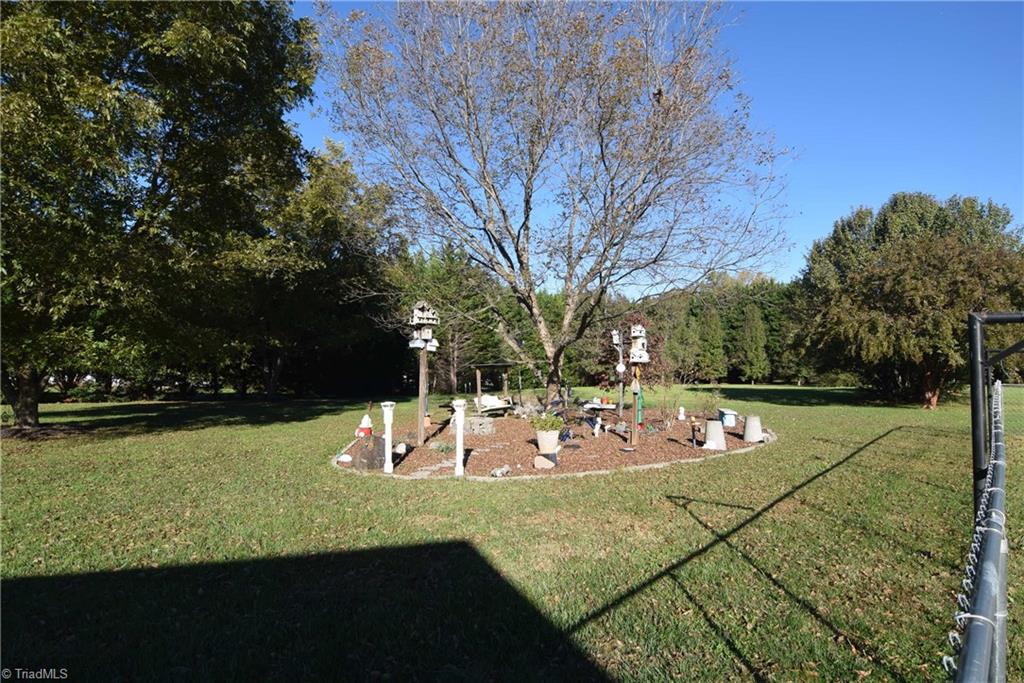 7207 Friendship Church Road Browns Summit, NC 27214 - Photo 4 of 49 Large, level backyard!