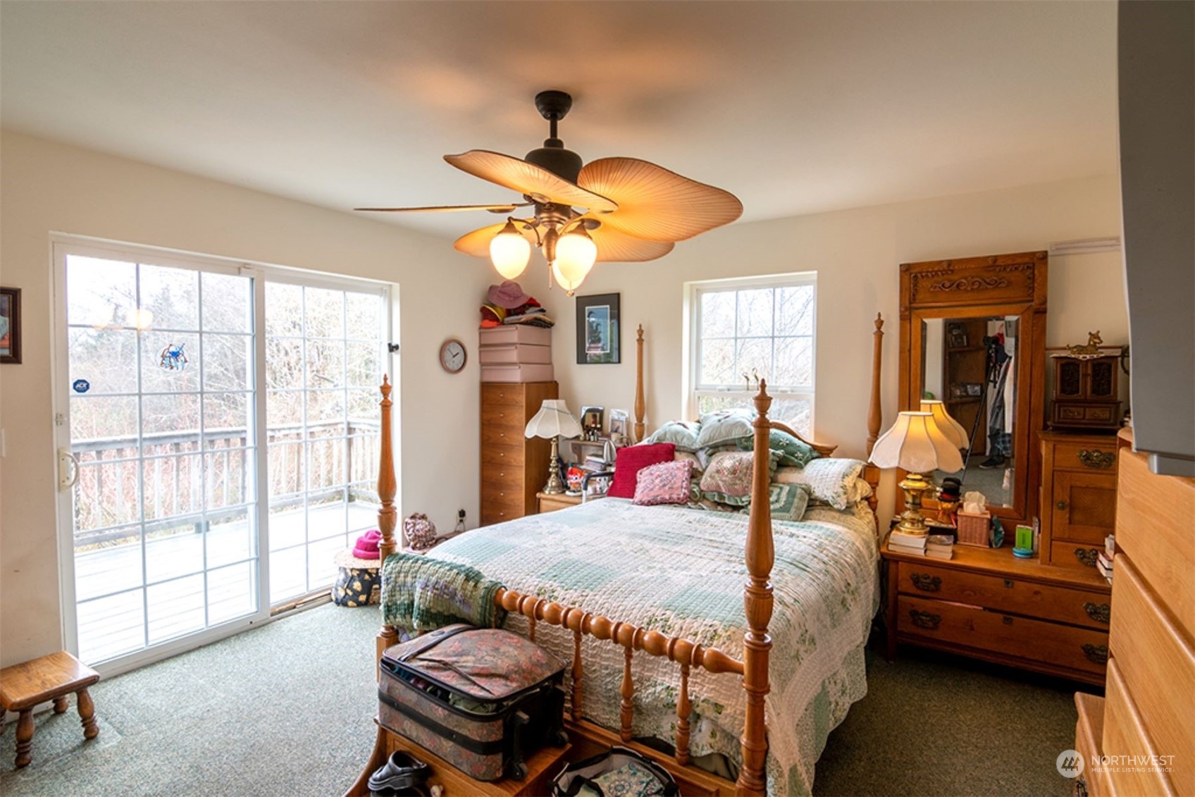 11 Condra Road Copalis Beach, WA 98535 - Photo 12 of 24 a bed room with a bed and a chair